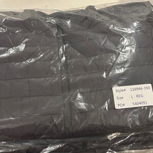 Black fleece jacket by Design Collective